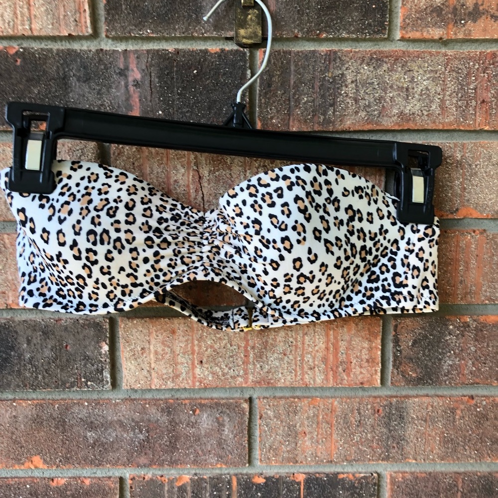 Victoria’s Secret leopard print bikini top size 34B.